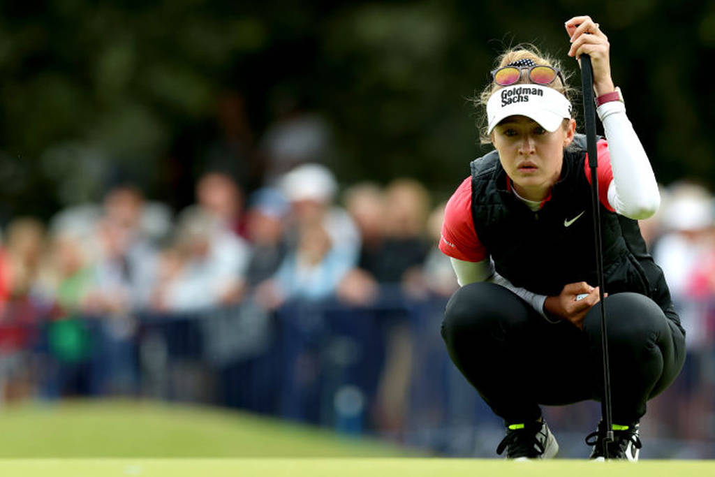 Nelly Korda reads a putt at Walton Heath